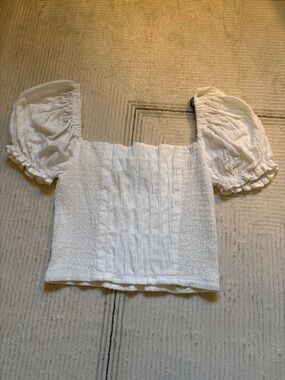 White puffed sleeve top